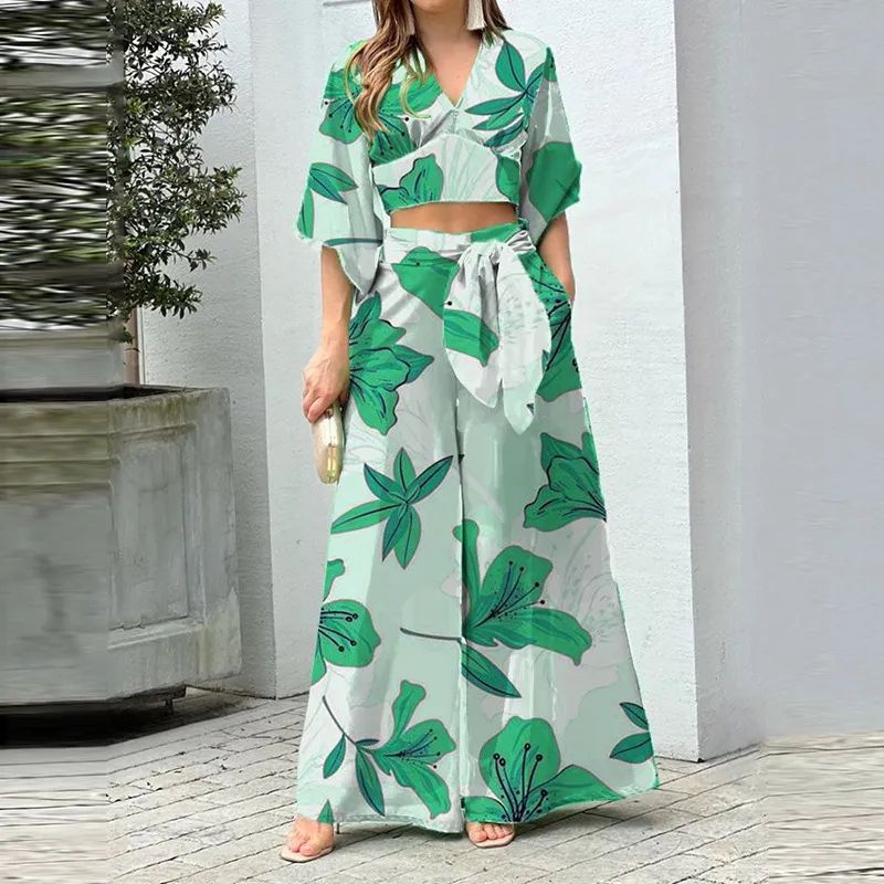 Elegant floral print jumpsuit, three-quarter sleeve V-neck crop top and high-waisted belted wide-leg pants, women's clothing. B102170 Elegant floral print jumpsuit, three-quarter sleeve V-neck crop top and high-waisted belted wide-leg pants, women's clothing. B102170