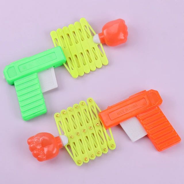 1PC Retractable Fist Shooter Trick Toy Gun Funny Child Plastic Toy Party Festival Gift For Fun Classic Elastic Telescopic Fist S4456712 - Tuzzut.com Qatar Online Shopping