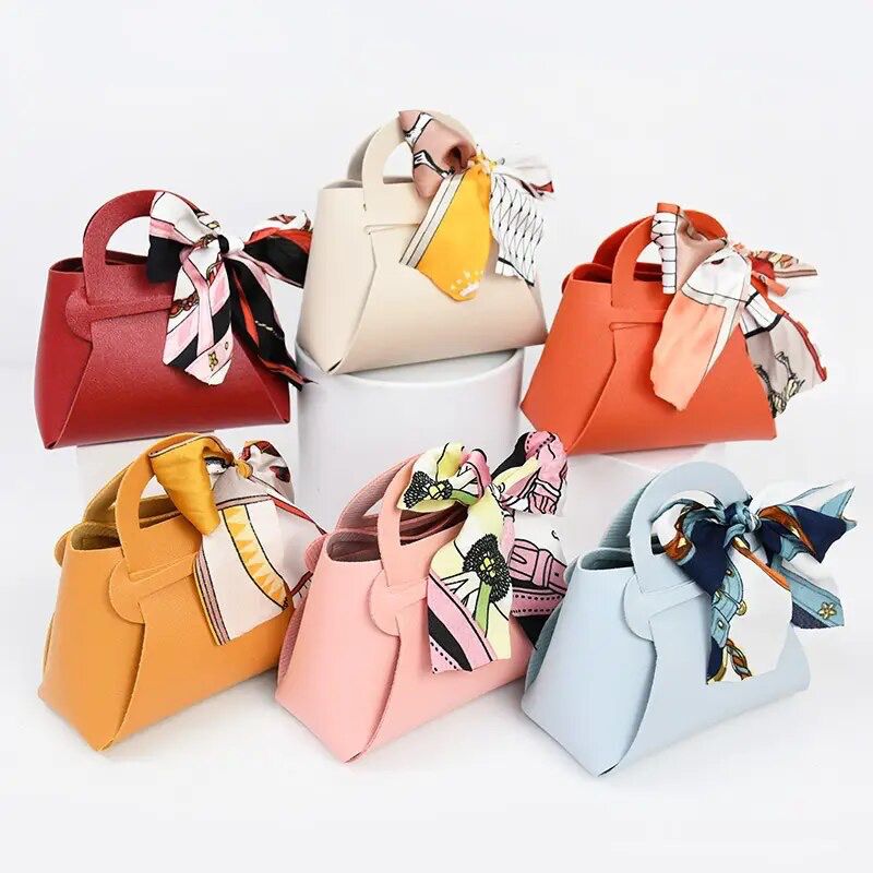 10 pcs Creative Leather Gifts Box with Ribbon Handbag Shape Candy Bag for Wedding Birthday Party 10 pcs Creative Leather Gifts Box with Ribbon Handbag Shape Candy Bag for Wedding Birthday Party