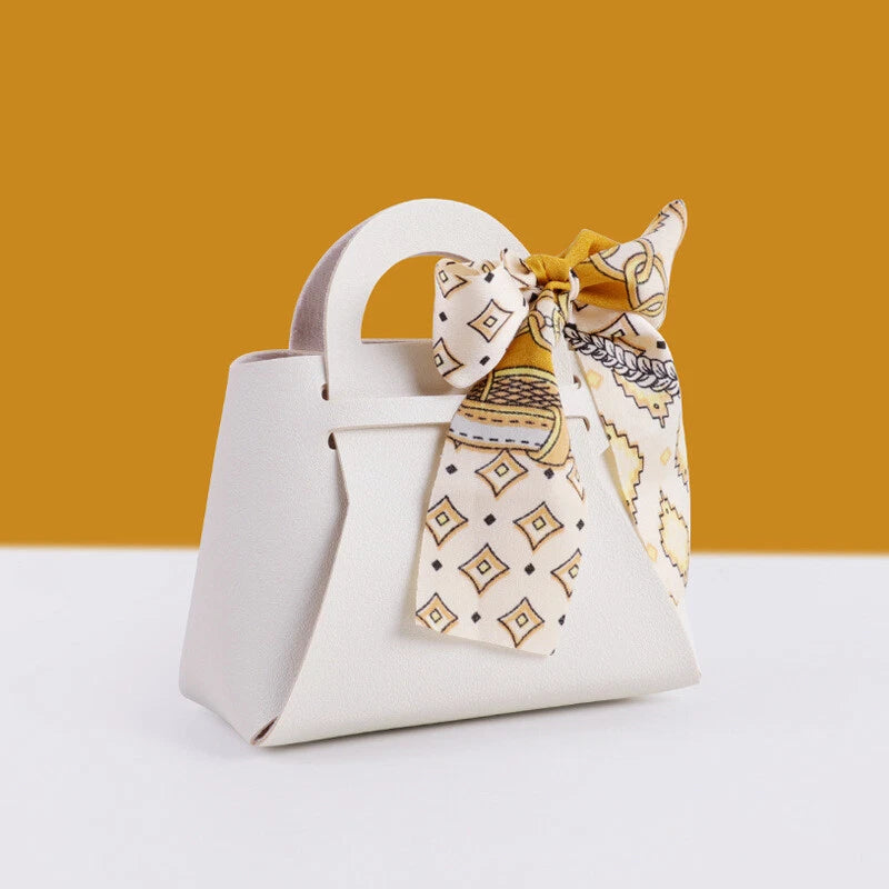 10 pcs Creative Leather Gifts Box with Ribbon Handbag Shape Candy Bag for Wedding Birthday Party 10 pcs Creative Leather Gifts Box with Ribbon Handbag Shape Candy Bag for Wedding Birthday Party